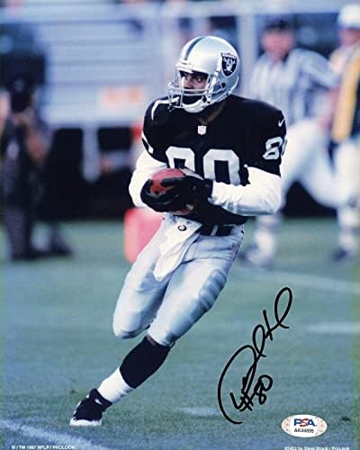 DESMOND HOWARD aláírt 8x10 fotó PSA/DNS-Oakland Raiders-Dedikált - Dedikált NFL-Fotók